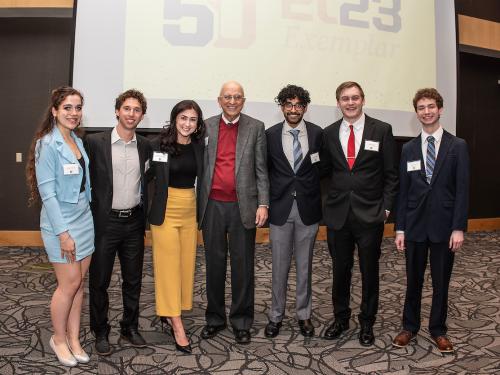 Scholars posing for a picture