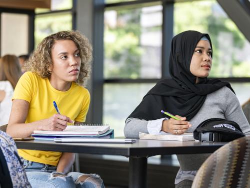 Student listening to lecture.