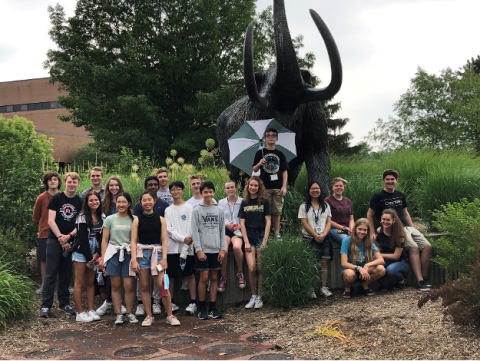 Students in front of mastodon
