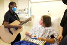 Part of Zana Mlotshwa's undergraduate training as music therapy undergrad at Purdue Fort Wayne includes interactions with patients that are designed to bring normalization and expression to a healthcare setting