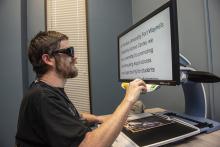 Cully O'Meara uses a MagniSight reader
