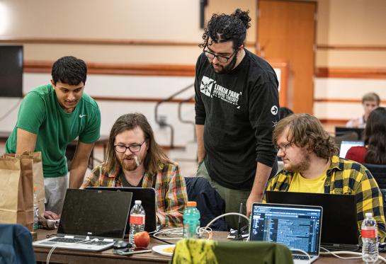 Students work together to create a video game.
