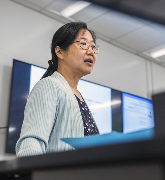 Professor Chao Chen teaching in a classroom