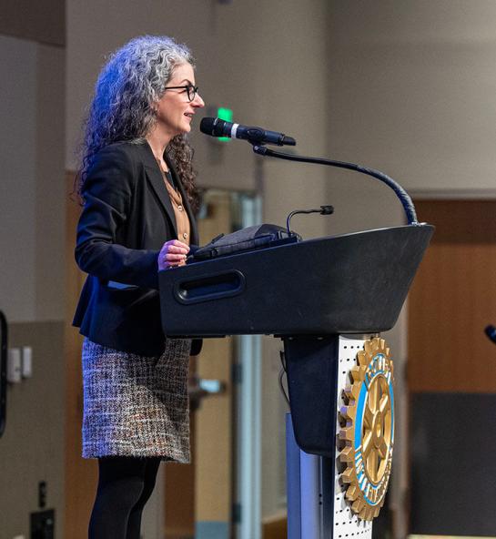 Janet Badia, dean of the College of Liberal Arts, speaks to high school students at the Fort Wayne Rotary Club's Peace and Conflict Resolution conference 