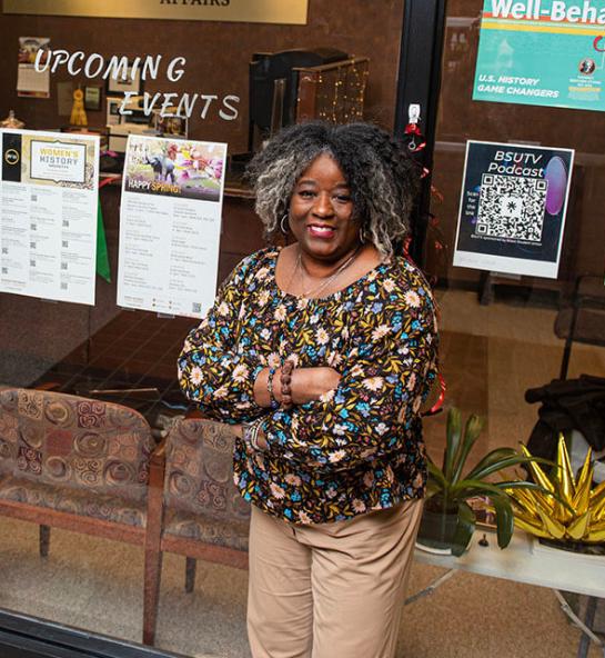 Rhonda Meriwether is standing in front of the Multicultural Center office