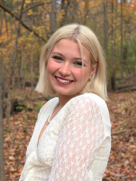 stella grable, student headshot, outdoor woods