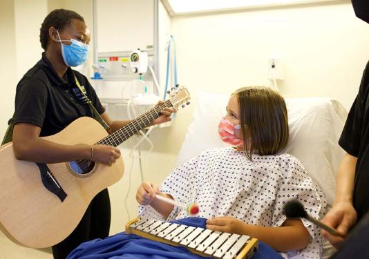 Part of Zana Mlotshwa's undergraduate training as music therapy undergrad at Purdue Fort Wayne includes interactions with patients that are designed to bring normalization and expression to a healthcare setting