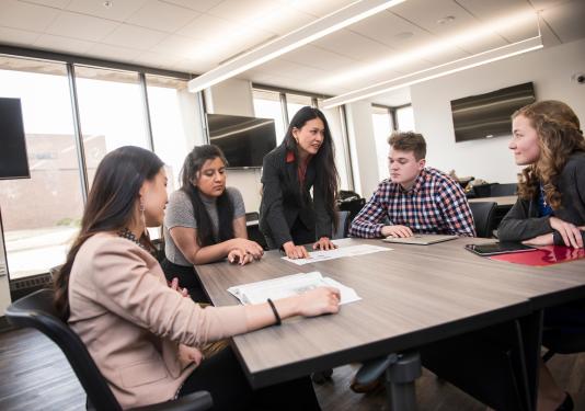 Business students utilize campus meeting spaces.