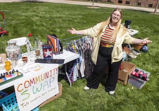 Sarah Claymiller shows off her community swap table