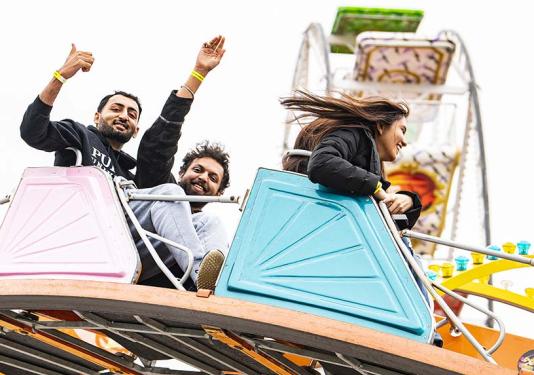 Students ride on the Casino carnival ride