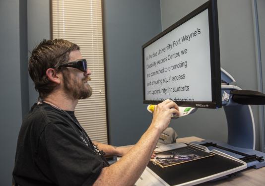 Cully O'Meara uses a MagniSight reader