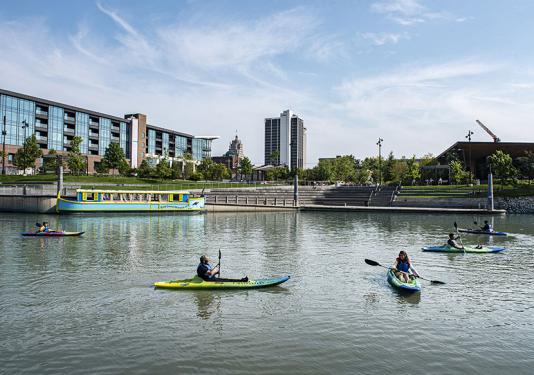 Students kayaking on the St. Mary's River in downtown Fort Wayne
