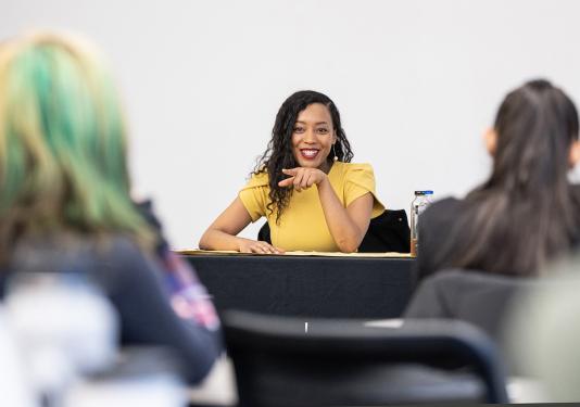 Omnibus speaker Moogega Cooper chats with a group of Honors students