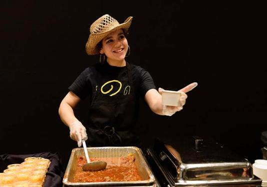 Serving up chili at the Chancellor's chili fest