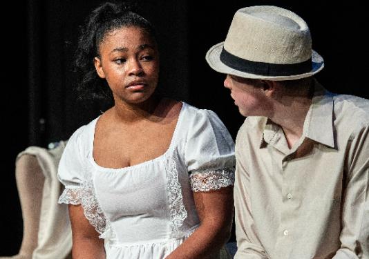 two actors on stage