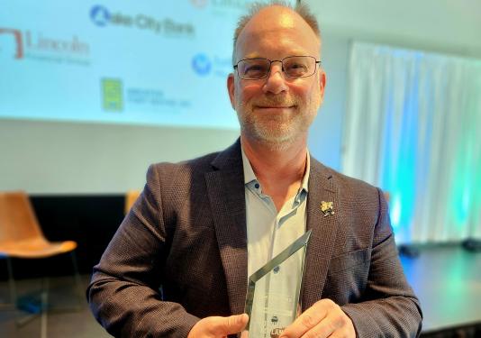 Dan Boylan with his Champions of Change award