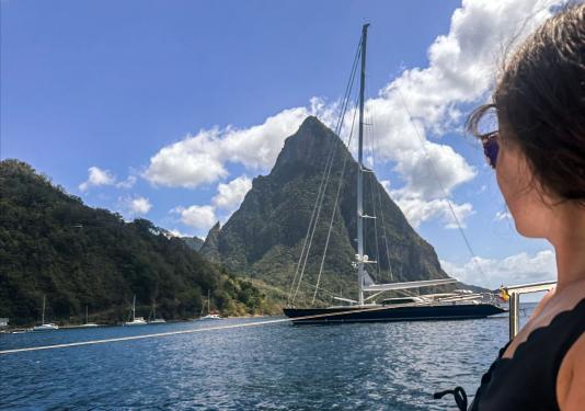 Maddie Book is looking at a sailboat