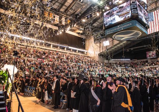 Students celebrating during the 2023 Commencement.