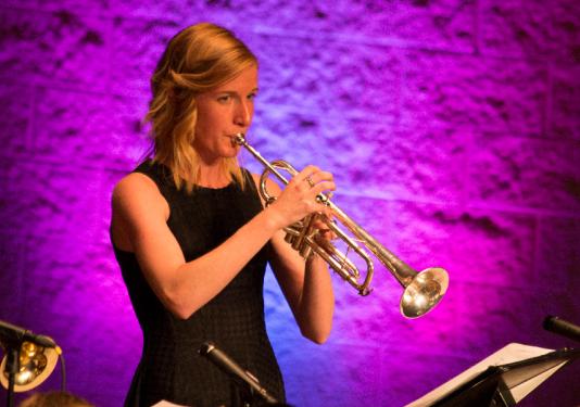 lady playing trumpet