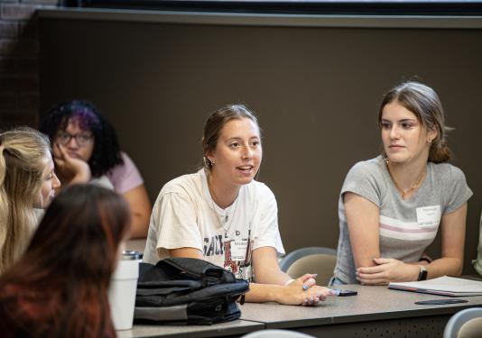 women in classroom setting in honors program suite 