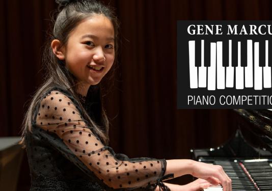 child playing paino