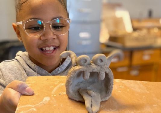 child with craft