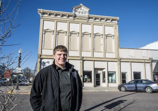 Caleb Evers in front of the Morvilius Opera House in Fort Recovery, Ohio.
