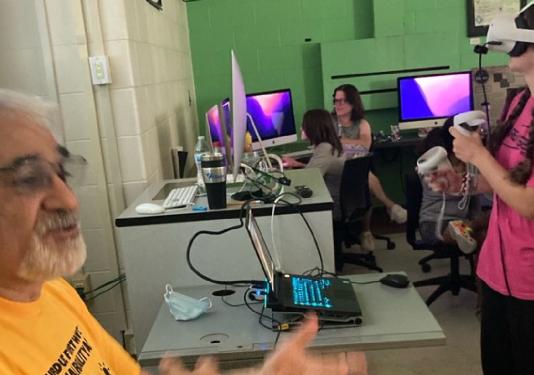 child learning how to use virtual reality