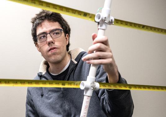 Andrew Danielson and his wildlife telemetry antenna.
