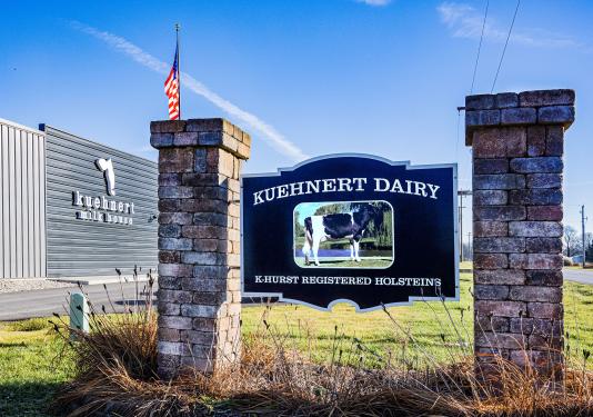 A sign marking the entrance to Kuehnert Dairy Farms.