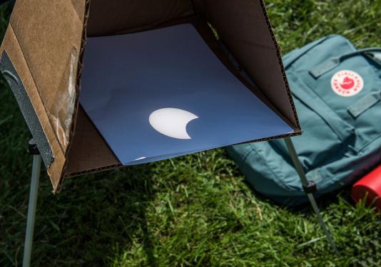 A pinhole box used to view a solar eclipse