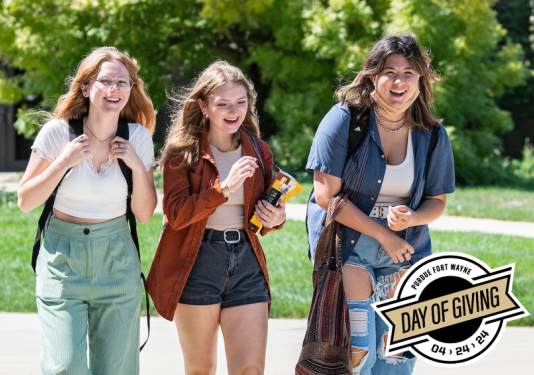 campus photo with 3 students smiling. day of giving 2024 logos included