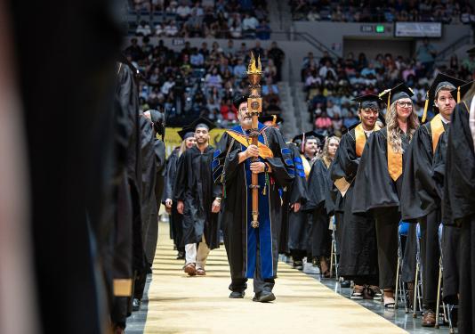 Carrying in the ceremonial mace at commencement