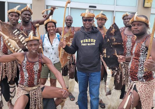 Professor Jospeter Mbuba was entertained by traditional dancers during his six-month Fulbright Scholar visit to Africa University in Zimbabwe.