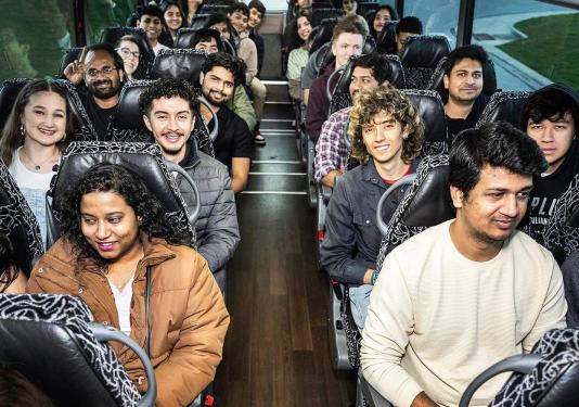 International students in a bus bound for Chicago