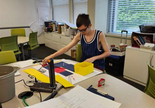 Student working on a blueprint