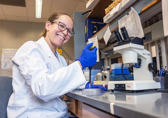 Rebecca Palu in a research lab