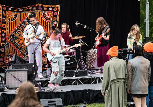 A band is performing onstage