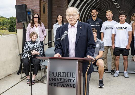 Paul Wolf speaks at the bridge dedication ceremony