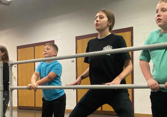 children at ballet bar