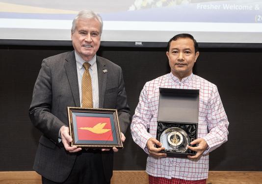 Ron Elsenbaumer, chancellor of Purdue University Fort Wayne, and Pon Nya Mon, chancellor of Mon National University.