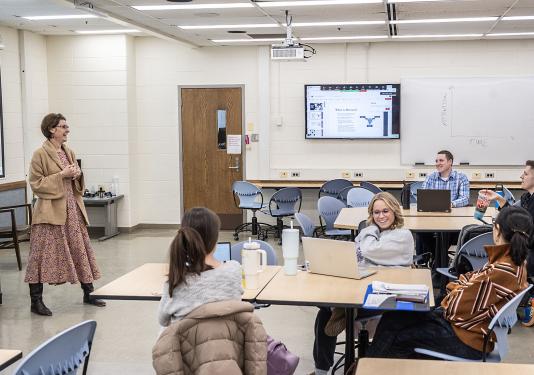 A group of teacher candidates in a classroom setting