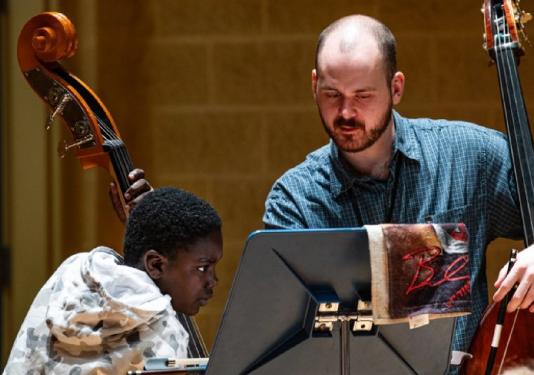 teacher and student on bass