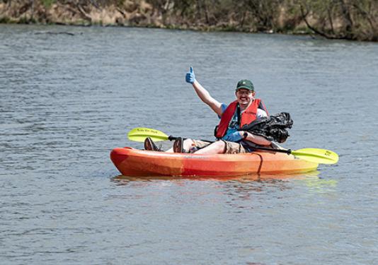 A student is in a kayak
