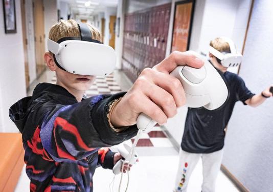 kids with virtual reality headsets on