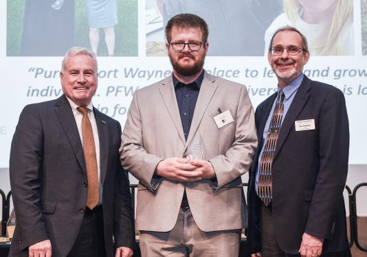 Chancellor Ron Elsenbaumer, Ryan Miller, and Dean Ron Friedman