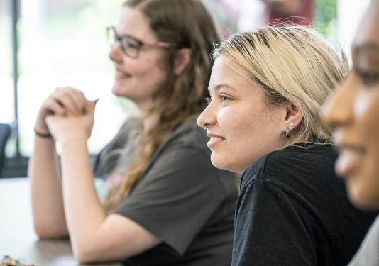 Closeup of three mock trial participants
