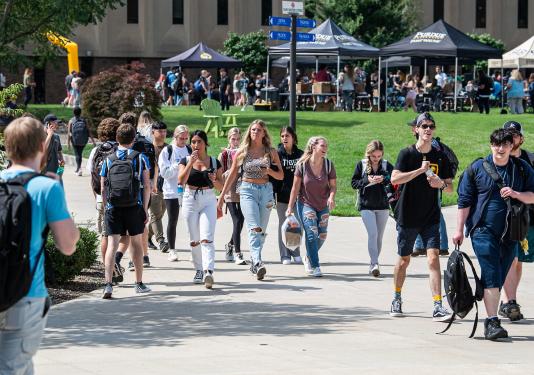 Students are walking down PFW's Mastodon Way
