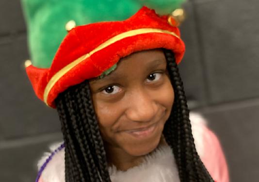 child wearing hat