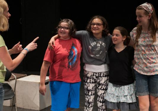 children recieving orders and smiling
